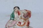 19th Century Small Staffordshire Pottery Boy Seated On Recumbent Spaniel Dog Figurine - Image 2