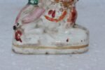 19th Century Small Staffordshire Pottery Boy Seated On Recumbent Spaniel Dog Figurine - Image 3